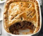 Savory Aberdeen Beef Pie with Crispy Bacon Delight